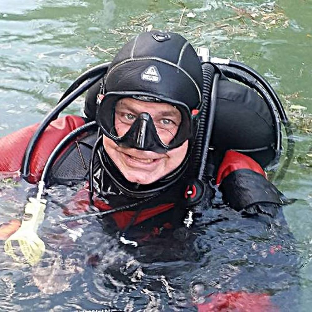 Scuba student giving an okay sign underwater